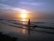 Stand Up Paddling bei Sonnenuntergang